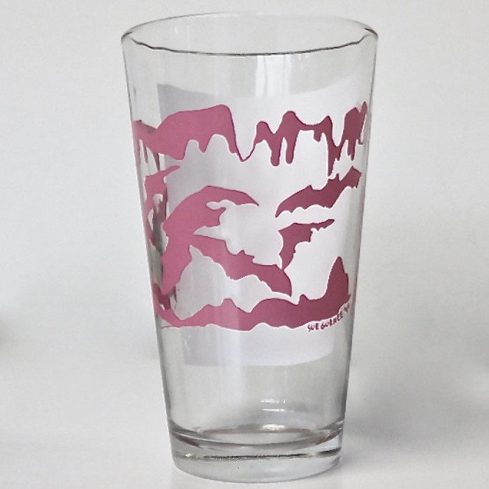 Bats Flying Through A Cave Pink Pint Glass - Product Image