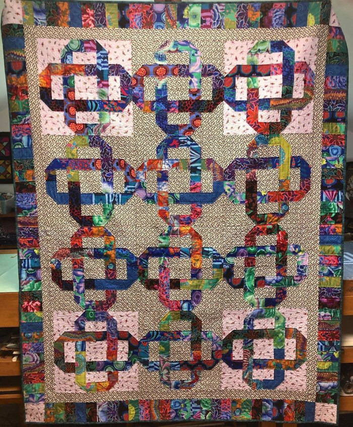 Knots In The Garden Bat Quilt By Emily Davis. 62 by 78 inches. - Product Image